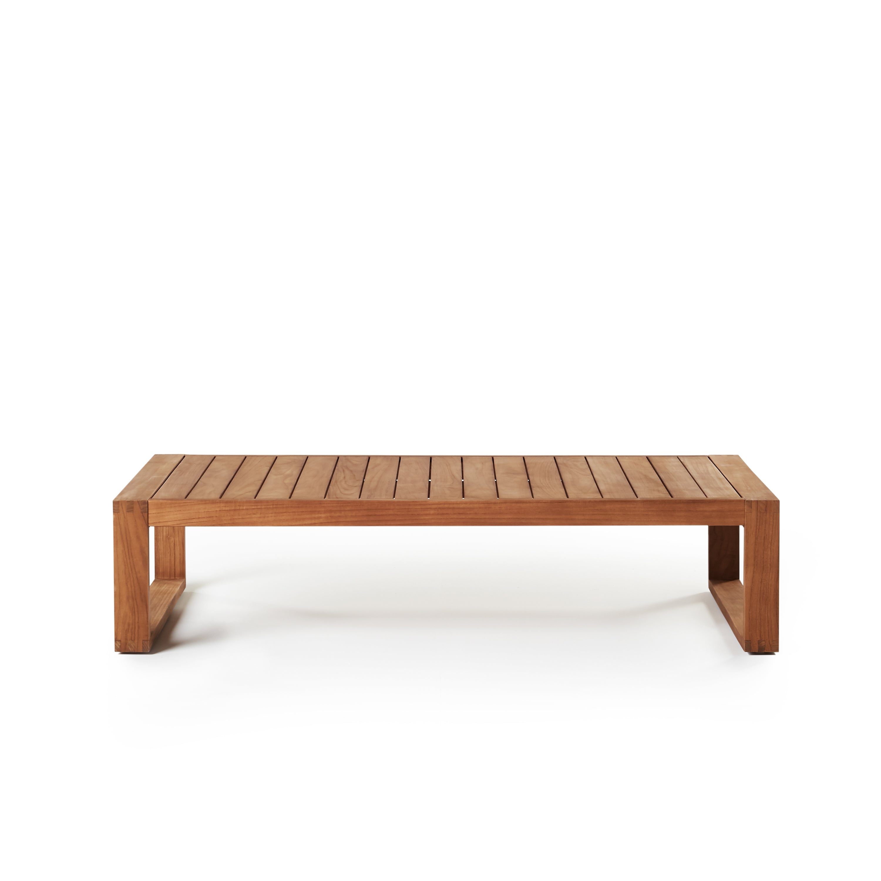 Belvedere Coffee Table by Terra Outdoor Living, crafted from solid premium teak with a crisp, modern feel, features clean architectural lines, a slatted top for water drainage, sled-style legs and a timeless design that complements a wide range of seating options.