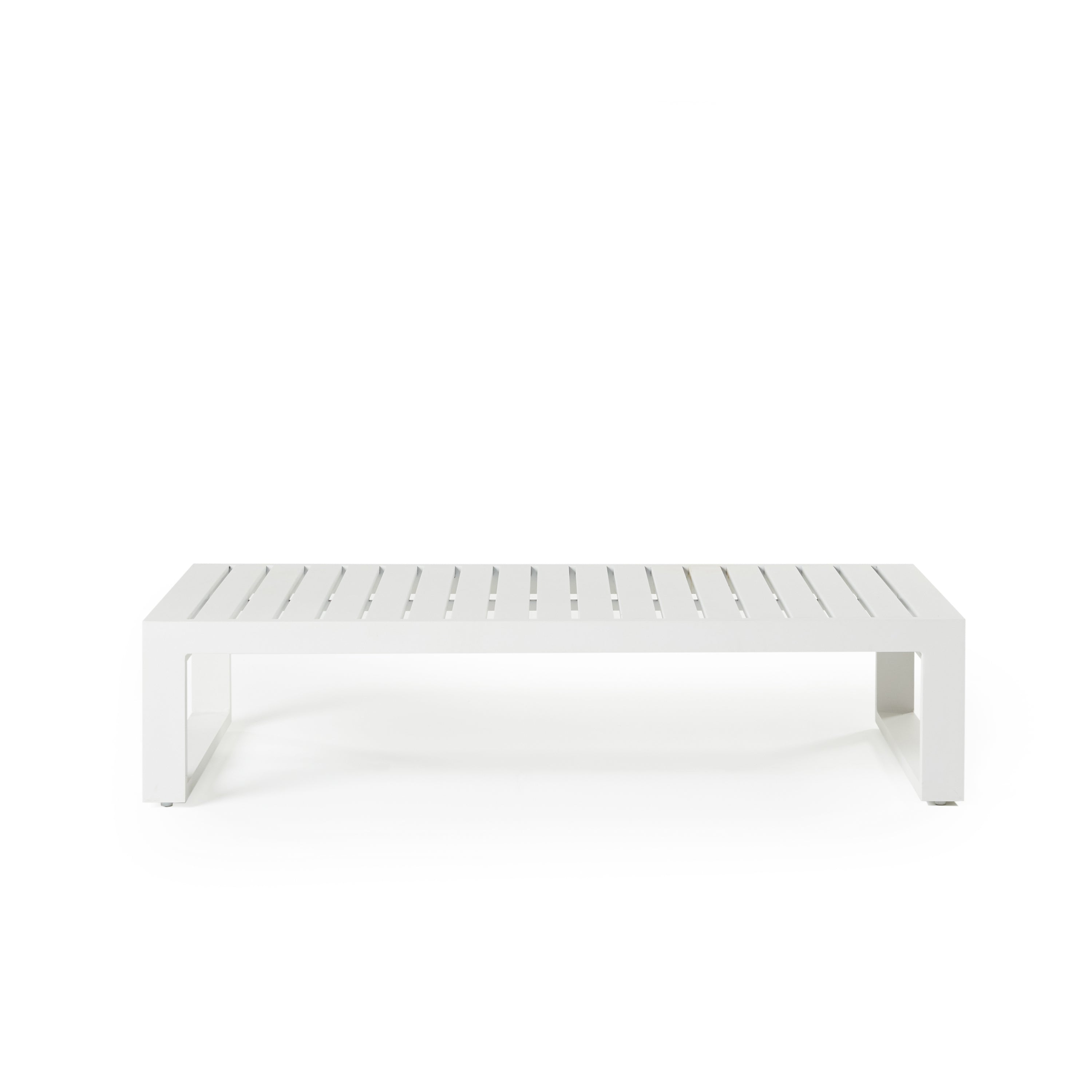 Belvedere Coffee Table by Terra Outdoor Living, crafted from durable powdercoated aluminum in textured white color, features architectural lines, a slatted top for easy drainage, sled-style legs, and a lightweight frame that complements the collection’s modern, low-profile seating.