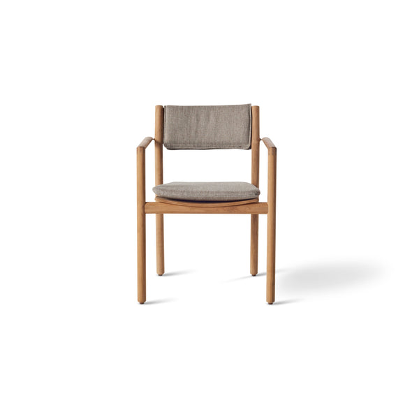 Aptos Dining Armchair by Terra Outdoor Living — crafted from premium plantation-grown teak with a compact European-inspired silhouette, featuring one seat cushion and one back cushion in weather-friendly olefin for softness and support; easily removable cushions add versatility, and the timeless design pairs seamlessly with any Terra dining table.