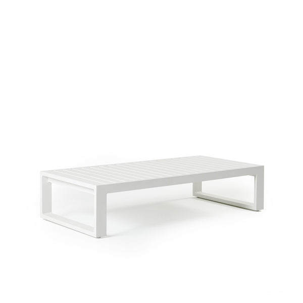 Belvedere Coffee Table by Terra Outdoor Living, crafted from durable powdercoated aluminum in textured white color, features architectural lines, a slatted top for easy drainage, sled-style legs, and a lightweight frame that complements the collection’s modern, low-profile seating.