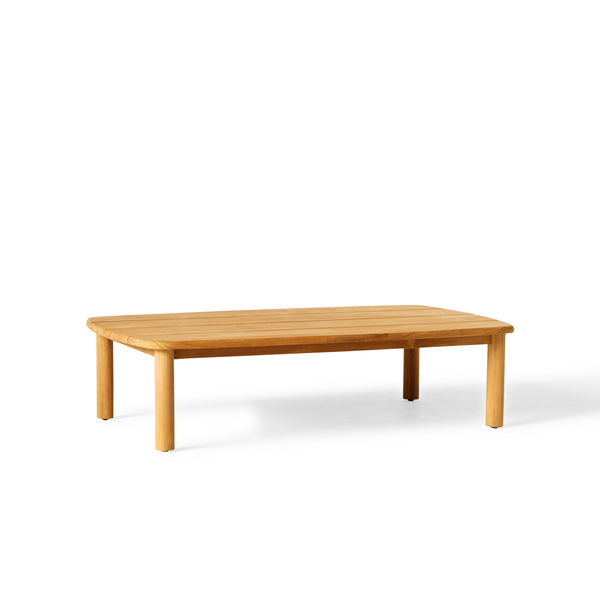 Stinson Coffee Table by Terra Outdoor Living made of premium teak in a natural finish, featuring gently curved edges. The slatted tabletop design allows for water drainage and offers ample space for drinks and snacks.